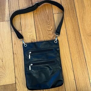 Sleek Black Crossbody Bag with Dual Zipper Pockets